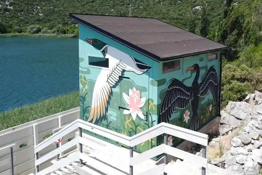 Small birdwatch with street art on its walls